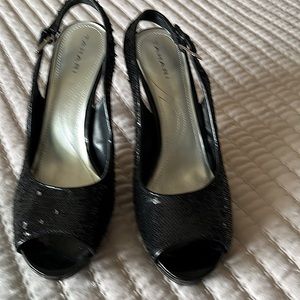 A Tahiti open toe black sequin shoe. 9 1/2 medium. Good condition.